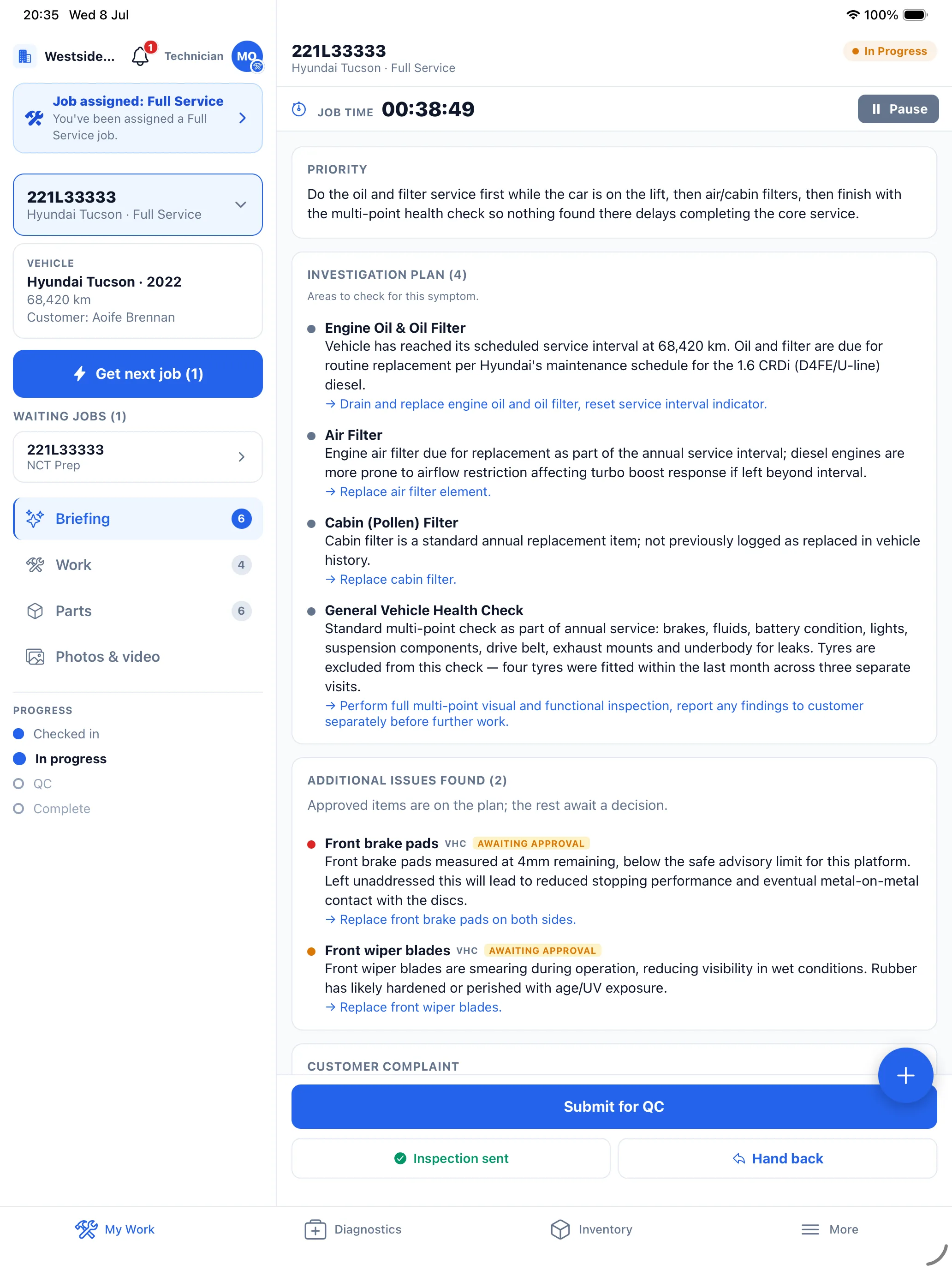 MechIQ native technician app on a tablet: an AI job briefing with a prioritised investigation plan, a live job timer, and vehicle health check findings awaiting customer approval